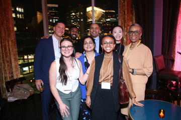 The 2026 fellows pose for a photo with Joan Reede at Grace by Nia.