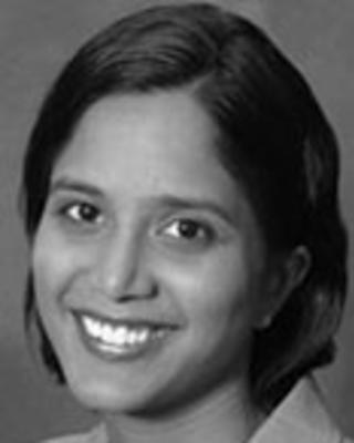 Kavitha Prakash has short black hair. 