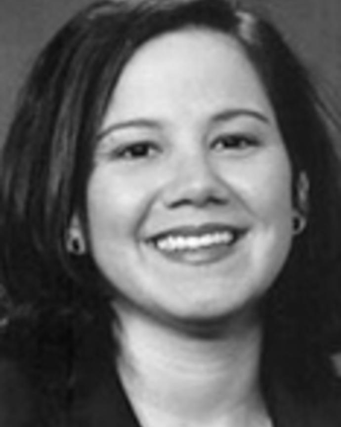 Ivette Motoal and medium-length black hair.