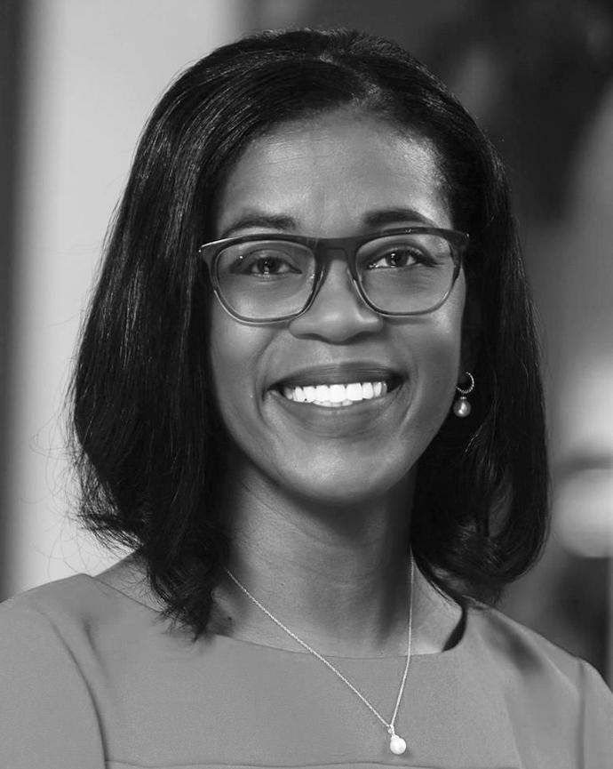 Tamarah Duperval-Brownlee has a straight black bob and glasses.